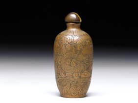 Appraisal: RARE BRONZE SNUFF BOTTLE Very elaborately engraved with dragons amid