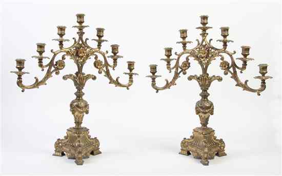 Appraisal: A Pair of Gilt Metal Seven-Light Candelabra having a baluster