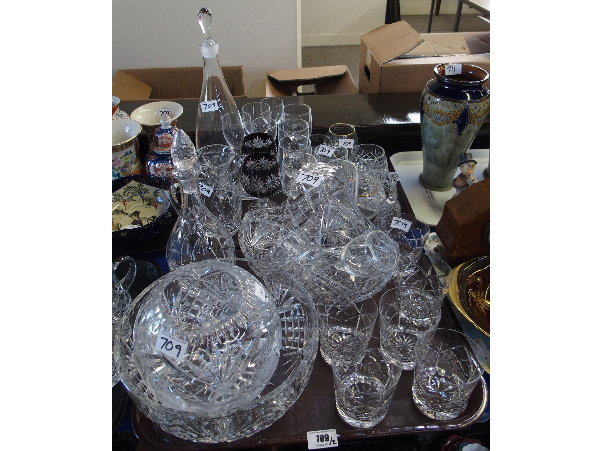 Appraisal: Two trays comprising various cut glass including decanters tumblers basket