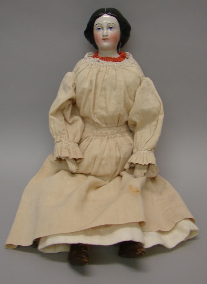 Appraisal: 's China Jenny Lind doll with black hair and blue