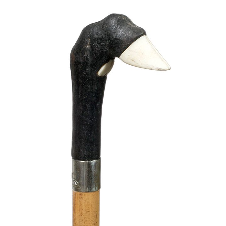 Appraisal: Bone Ebony Equestrian Cane Ca - A precisely carved piece