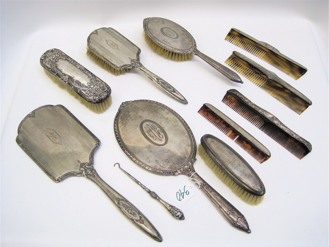 Appraisal: ELEVEN STERLING SILVERPLATED DRESSER ITEMS in assorted patterns Sterling by