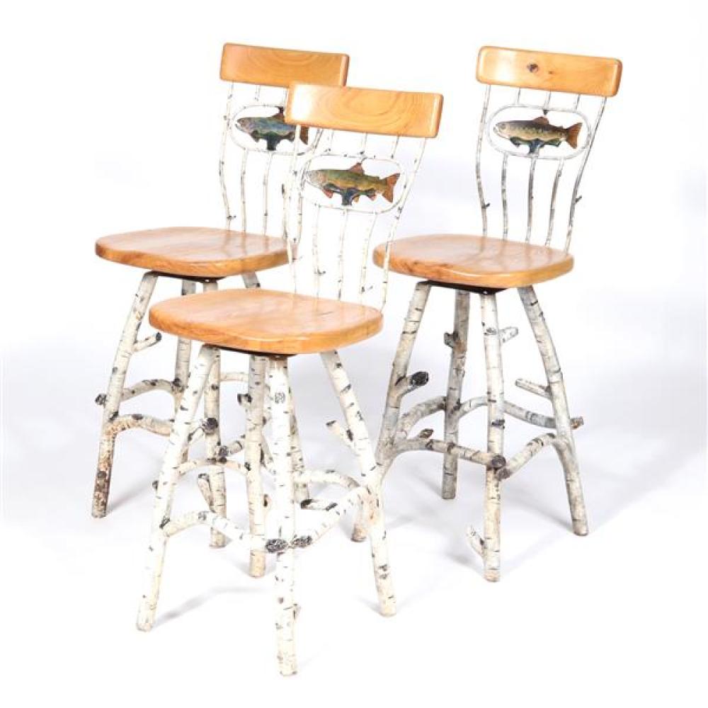 Appraisal: THREE ARTISAN MADE SWIVEL BAR STOOLS FROM JACKSON HOLE WY