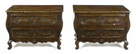 Appraisal: A Pair of French Walnut Commodes each having a rectangular