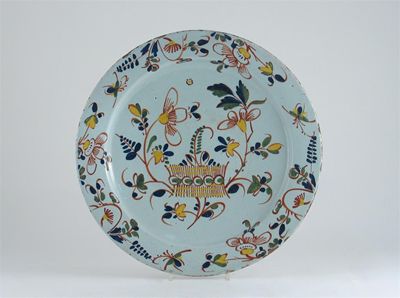 Appraisal: A polychrome Delftware dish painted with a pattern of stylized