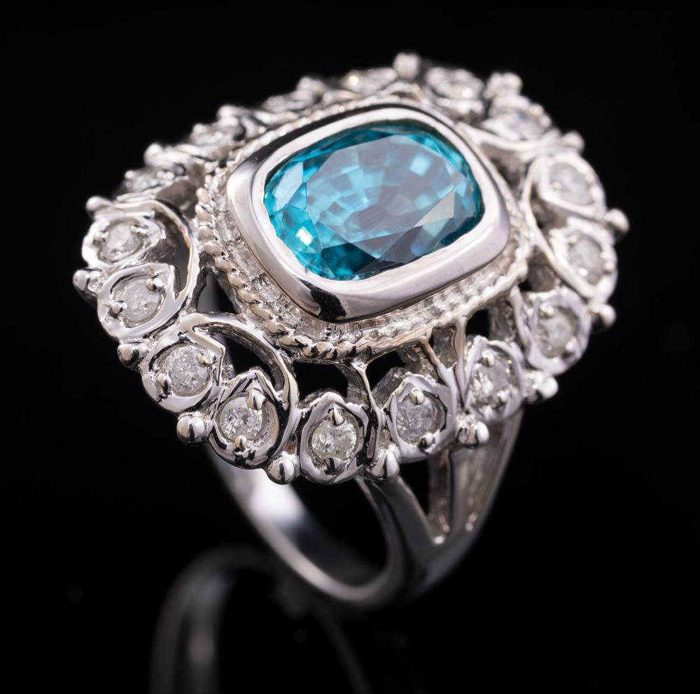 Appraisal: kt White Gold Zircon and Diamond Ring center bezel set