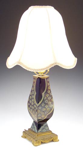 Appraisal: FRENCH ART GLASS TABLE LAMP Amethyst glass with gold stencil