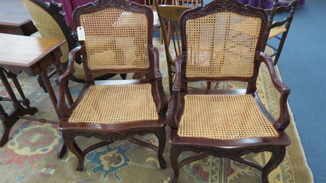 Appraisal: Pair of Carved Mahogany Chairs cane seats and backs