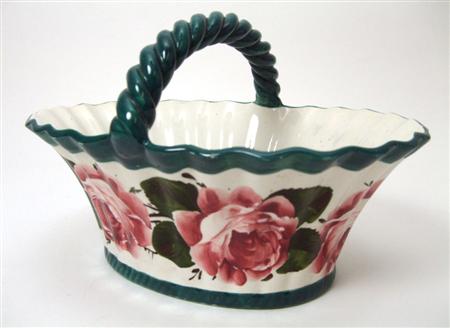 Appraisal: WEMYSS MEDIUM BASKET EARLY TH CENTURY decorated with cabbage roses