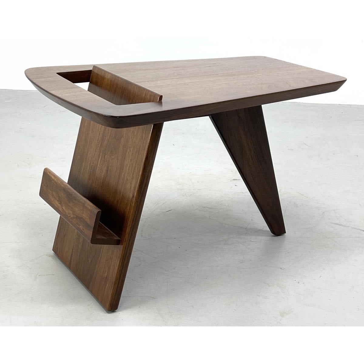 Appraisal: Magazine Table in the Style of Jens Risom in Walnut