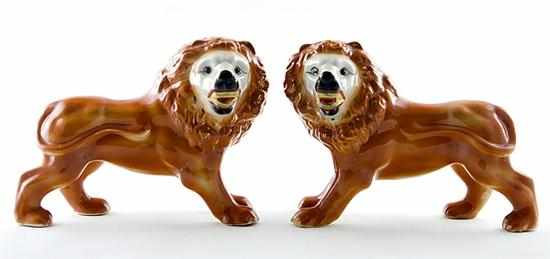 Appraisal: Pair Staffordshire figures of lions late th century pair of