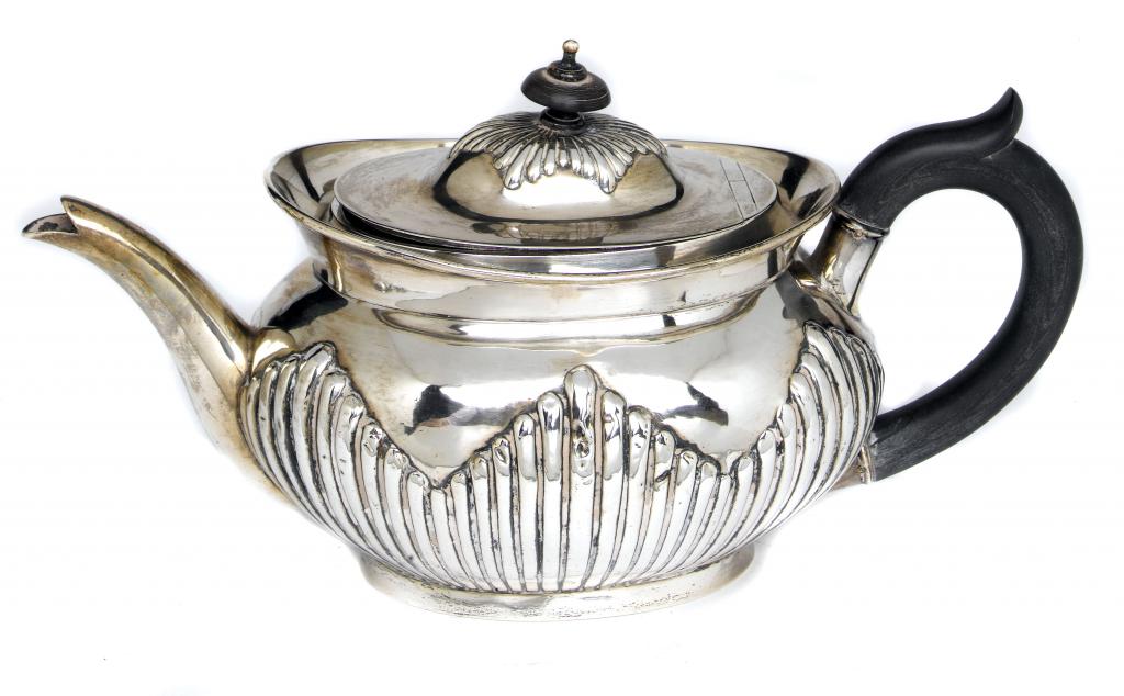 Appraisal: A VICTORIAN OVAL TEAPOT the domed lid with integral hinge