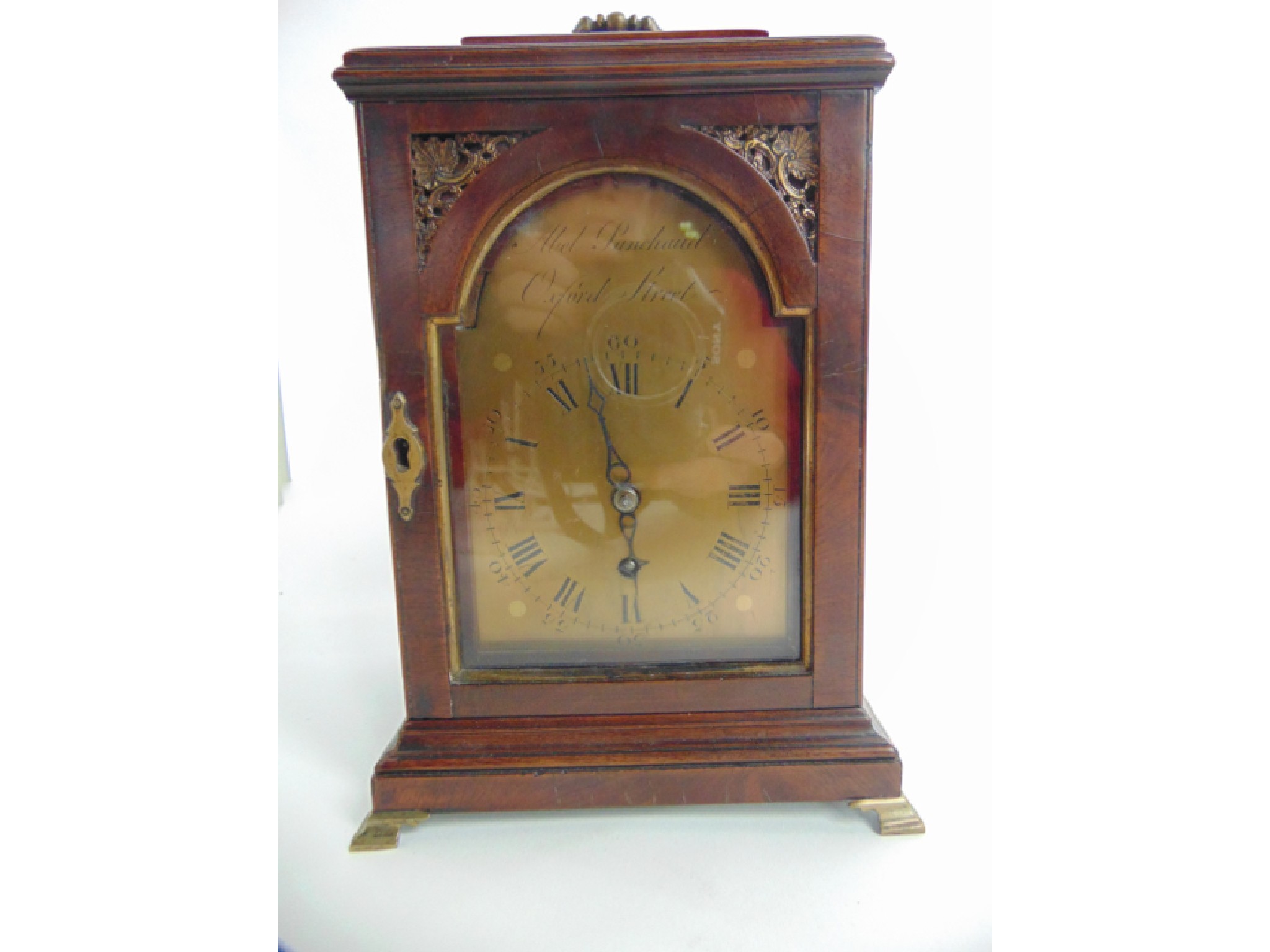 Appraisal: A small th century bracket clock walnut case broken arch