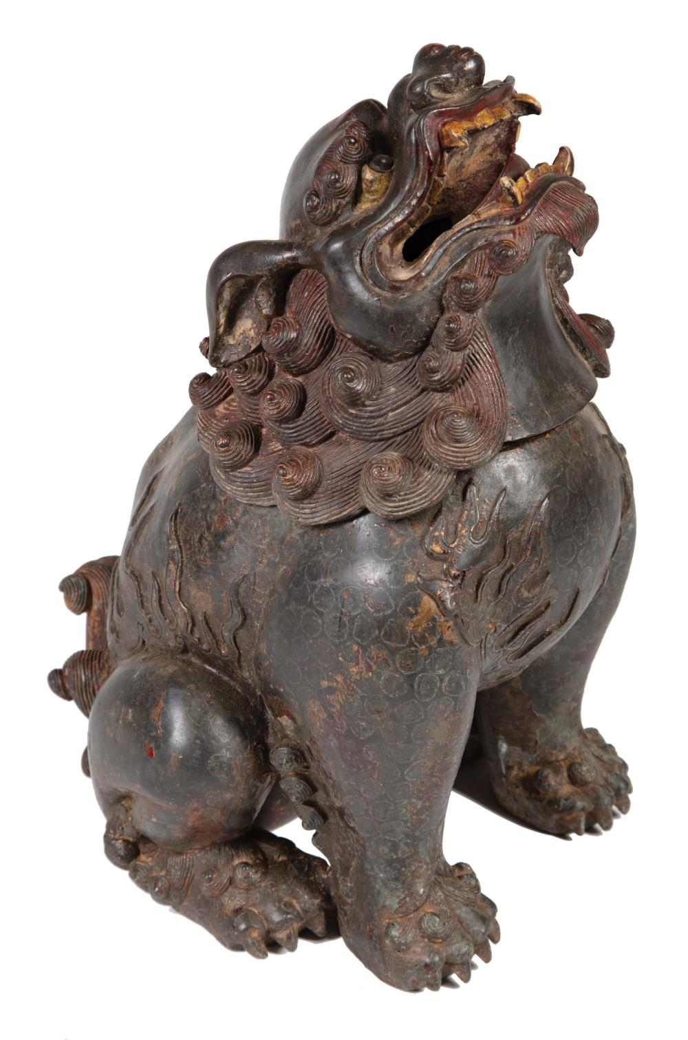 Appraisal: Chinese Patinated Metal Buddhist Lion Censer modeled seated on its