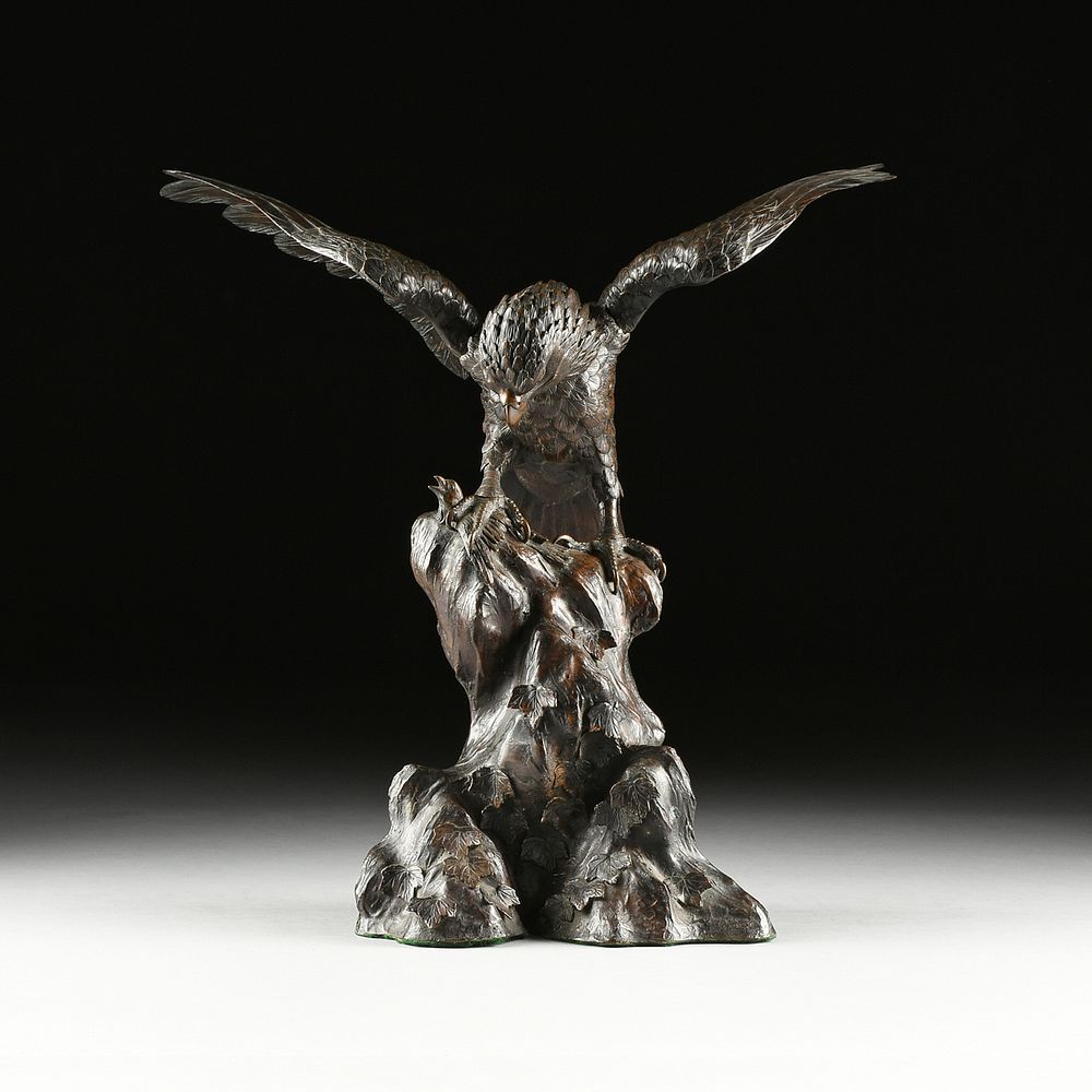 Appraisal: A JAPANESE PATINATED BRONZE FIGURE OF A SPREAD WINGED EAGLE