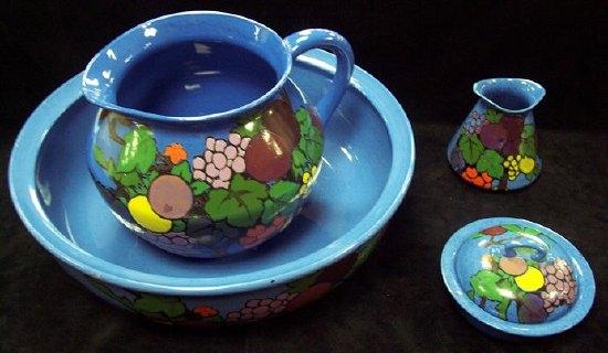 Appraisal: An Adderley's toilet service of four pieces painted fruit on