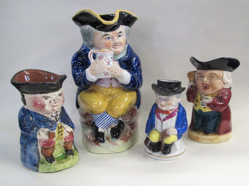 Appraisal: Pottery Toby jug and three others