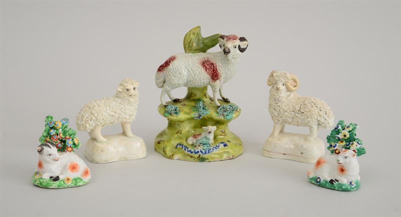 Appraisal: TWO PAIRS OF PEARLWARE SHEEP AND A SINGLE PEARLWARE RAM