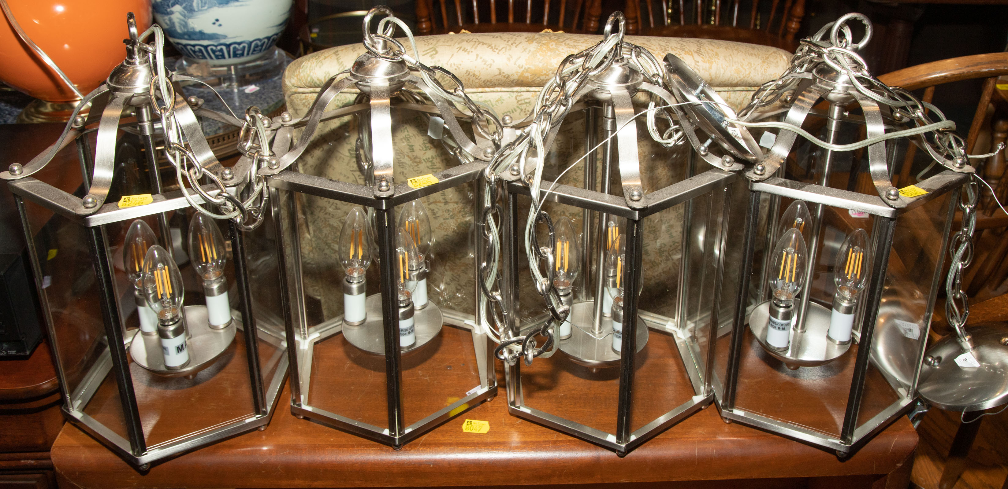 Appraisal: SET OF FOUR METAL GLASS HANGING PORCH LIGHTS Modern with