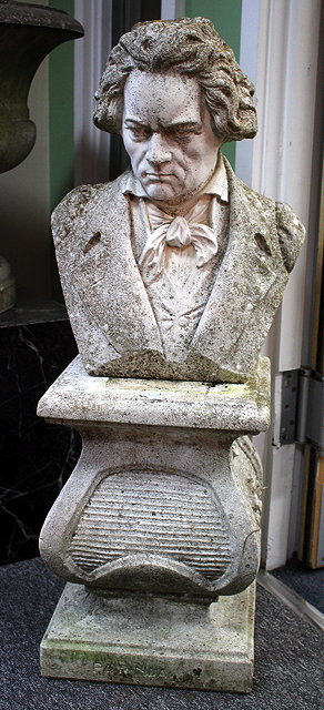 Appraisal: A COMPOSITE STONE BUST OF BEETHOVEN on a square plinth