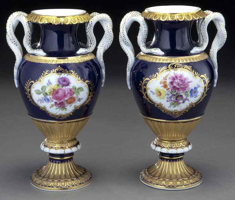 Appraisal: Pr Meissen porcelain cobalt urns with serpenthandles each with a