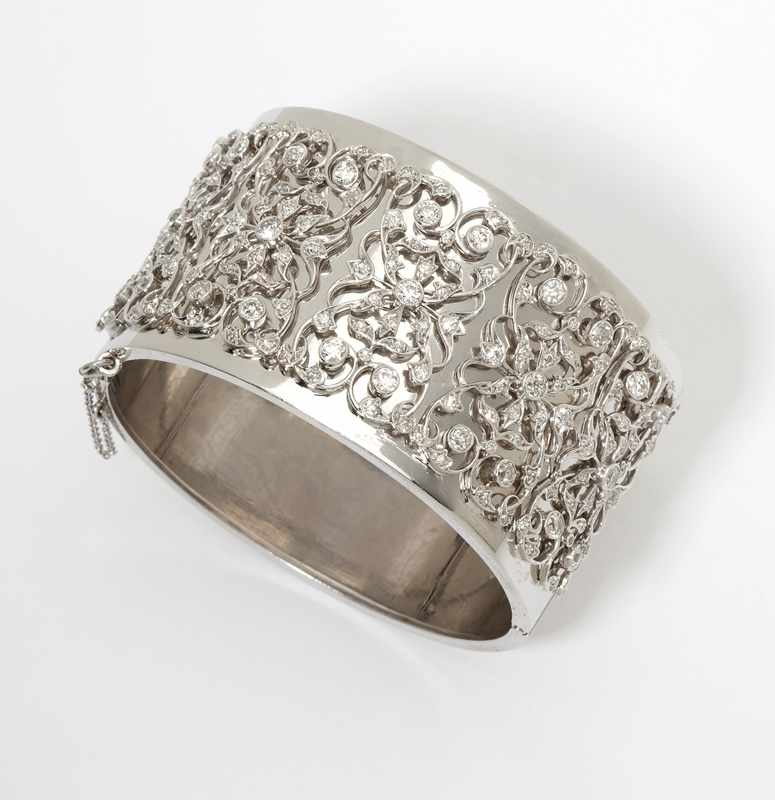 Appraisal: Designed topped with an Art Deco diamond and platinum bracelet