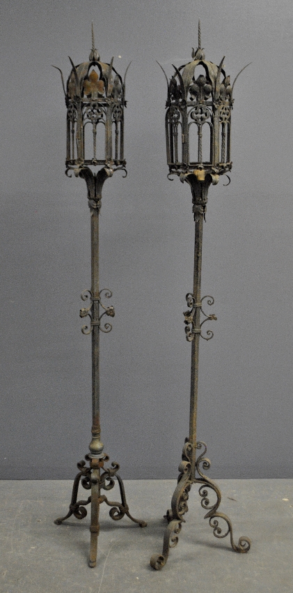 Appraisal: - Two similar wrought iron Gothic form standing lamps electrified