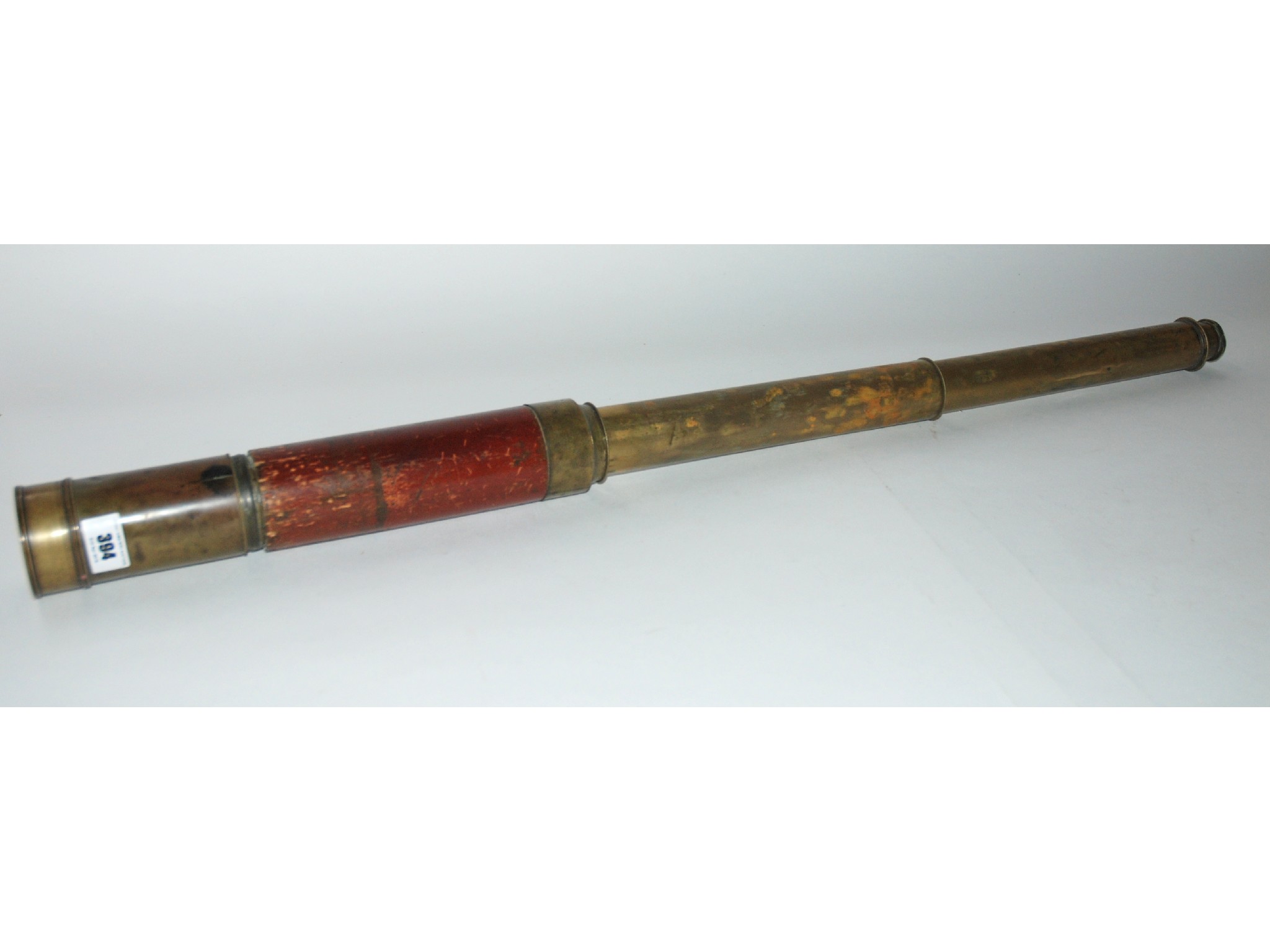 Appraisal: A brass two draw telescope by Dolland London