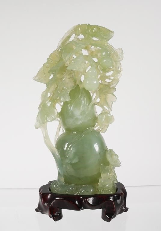 Appraisal: Green hardstone carving of a tree with fruit Sculpture measures