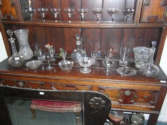 Appraisal: A LARGE COLLECTION OF GLASSWARE to include champagne flutes decanters