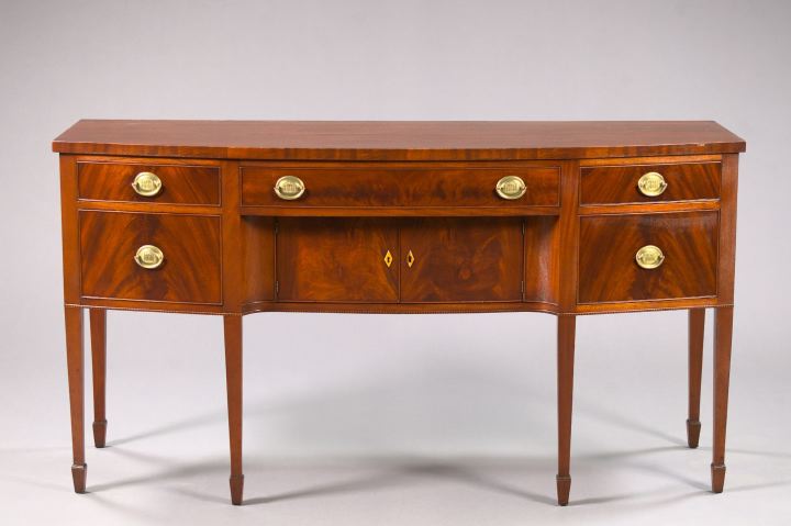 Appraisal: George III-Style Mahogany Sideboard in the Hepplewhite taste of bowfront