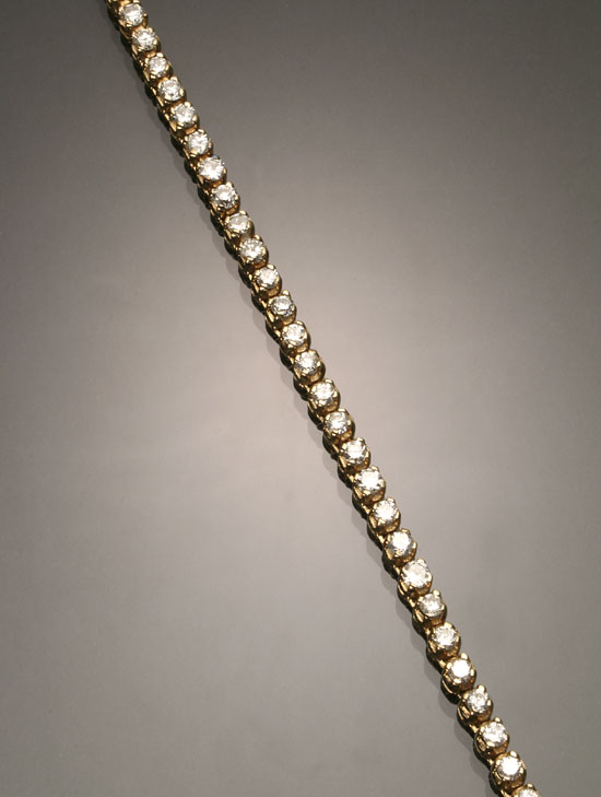 Appraisal: -Karat Yellow-Gold and Diamond Tennis Bracelet Set with forty-four round