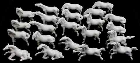 Appraisal: TWENTY-TWO WHITE PORCELAIN HORSES in six various poses - h