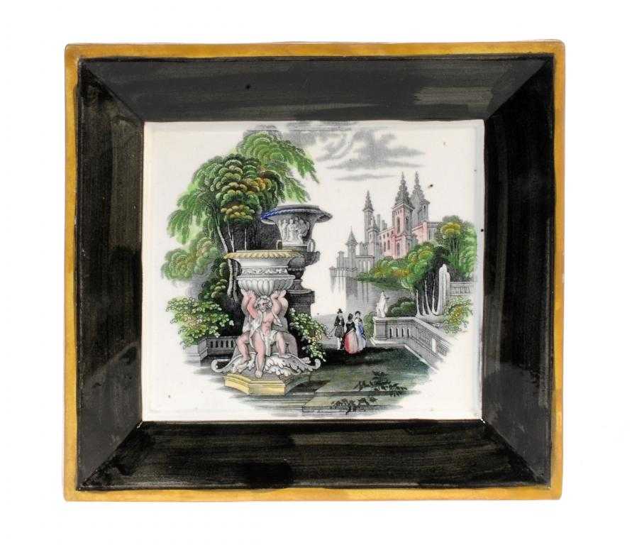 Appraisal: A WHITE EARTHENWARE PLAQUE with integral frame printed in black