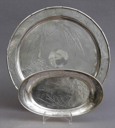 Appraisal: TWO CHINESE ENGRAVED SILVER TRAYS Each with bamboo shoots centering