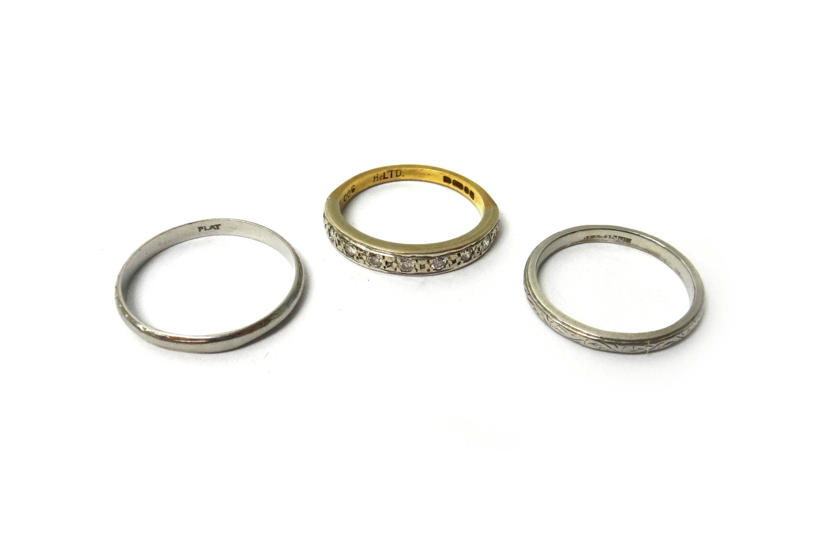 Appraisal: An ct gold and diamond set nine stone half hoop