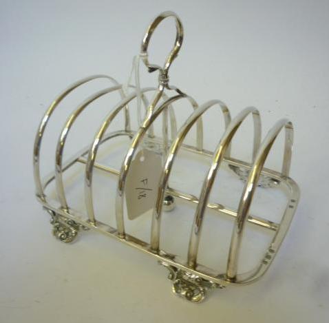 Appraisal: A VICTORIAN SCOTTISH TOAST RACK maker Robert Grey Sons Glasgow