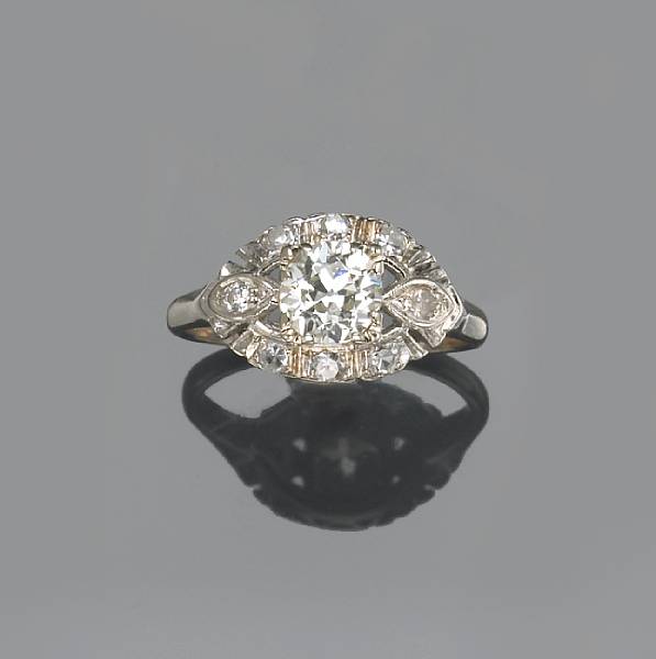 Appraisal: An art deco diamond platinum and k white gold ring