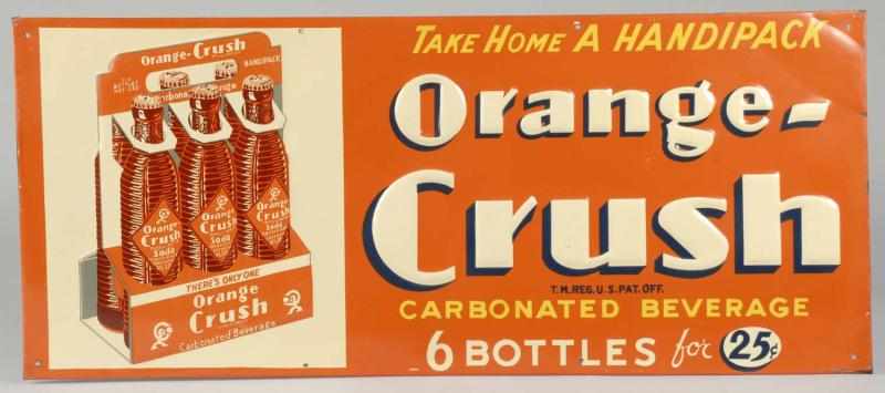 Appraisal: Embossed Tin Orange Crush Sign Description s Features wonderful six-pack