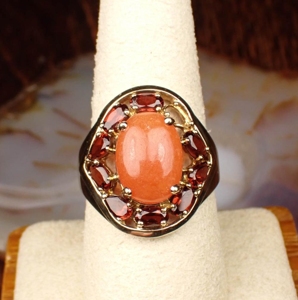 Appraisal: ORANGE JADE GARNET AND YELLOW GOLD RING The k yellow