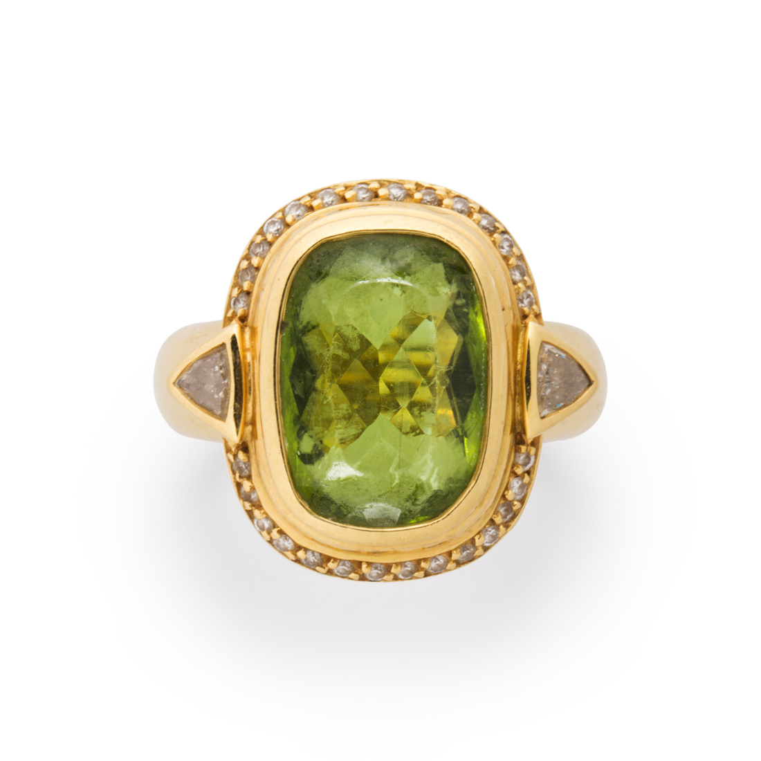 Appraisal: A PERIDOT DIAMOND AND EIGHTEEN KARAT GOLD RING A peridot