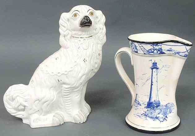 Appraisal: Staffordshire seated white spaniel h mid th c and a