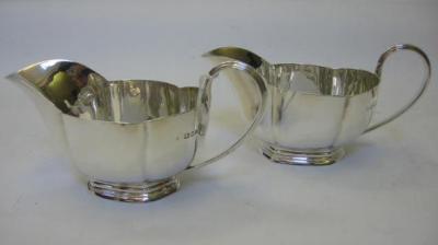 Appraisal: A PAIR OF SAUCEBOATS maker's mark D F London of