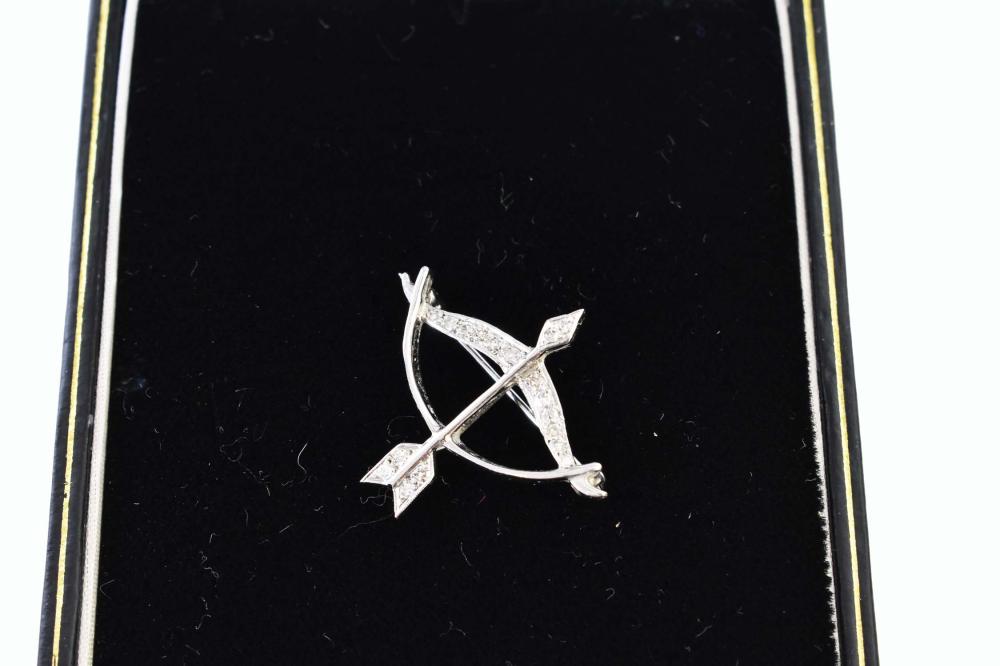 Appraisal: LADIES WHITE GOLD AND DIAMONDS BOW AND ARROW PINLady's White