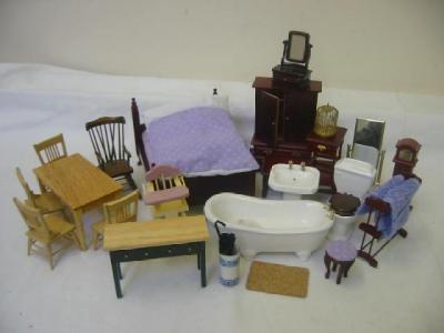 Appraisal: A selection of dolls house furniture including a ceramic bathroom