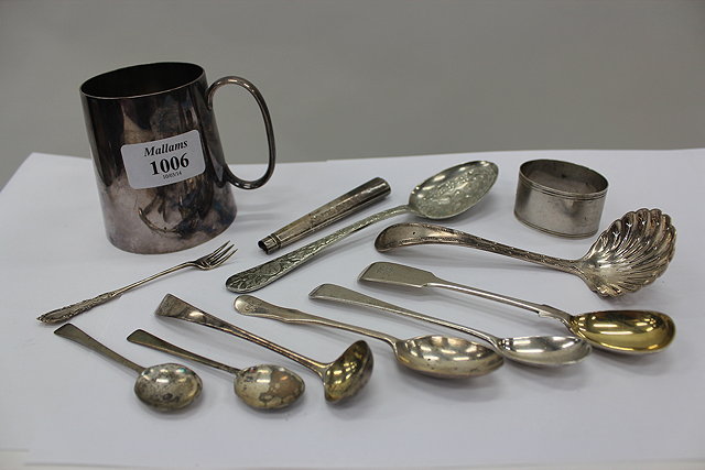 Appraisal: A SILVER SUGAR SIFTER together with various silver condiment spoons