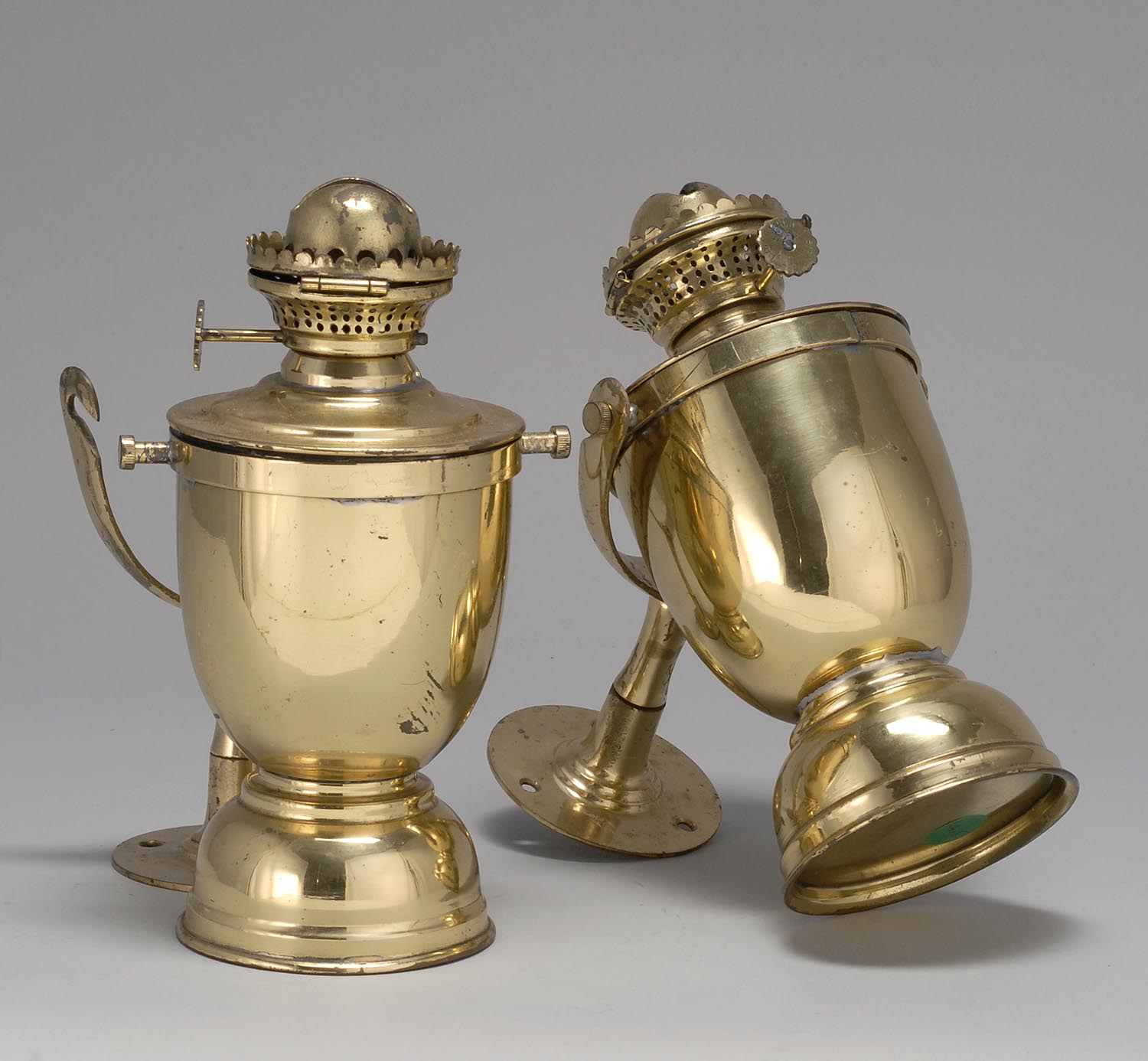 Appraisal: PAIR OF BRASS GIMBAL LAMPS th Century copies of th