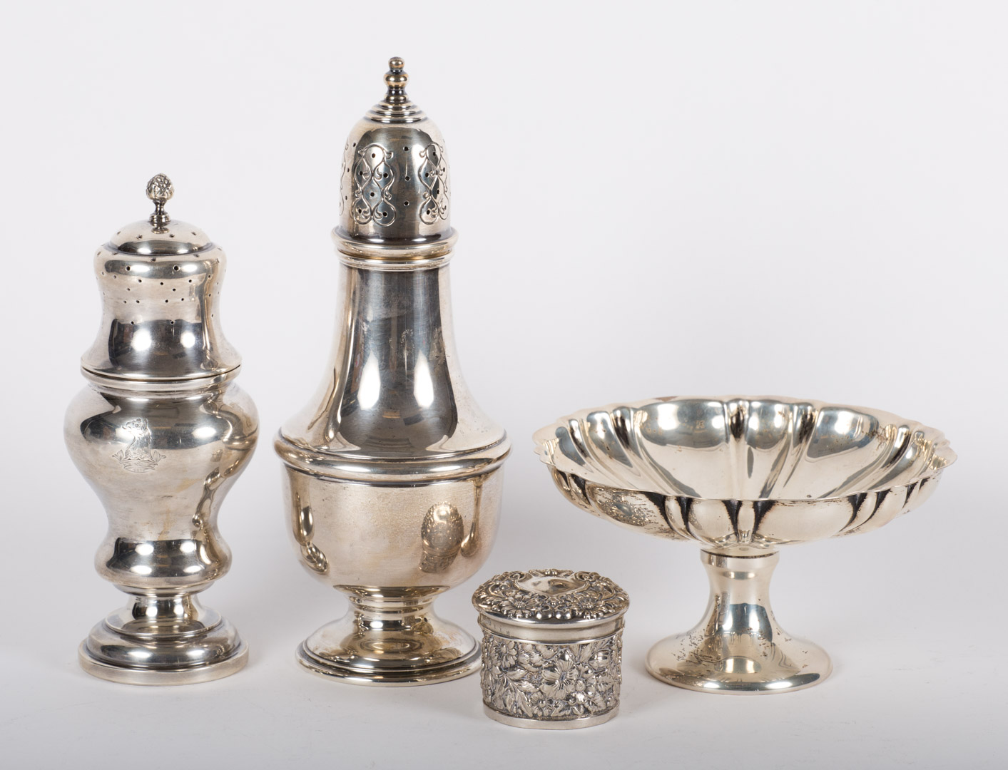 Appraisal: American sterling silver table articles including two muffineers and a