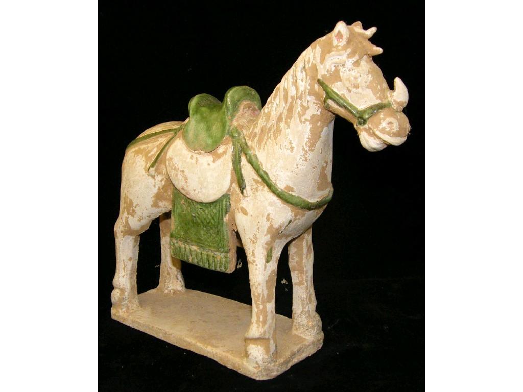 Appraisal: Ming period terracotta pony with green glazed saddle and saddle