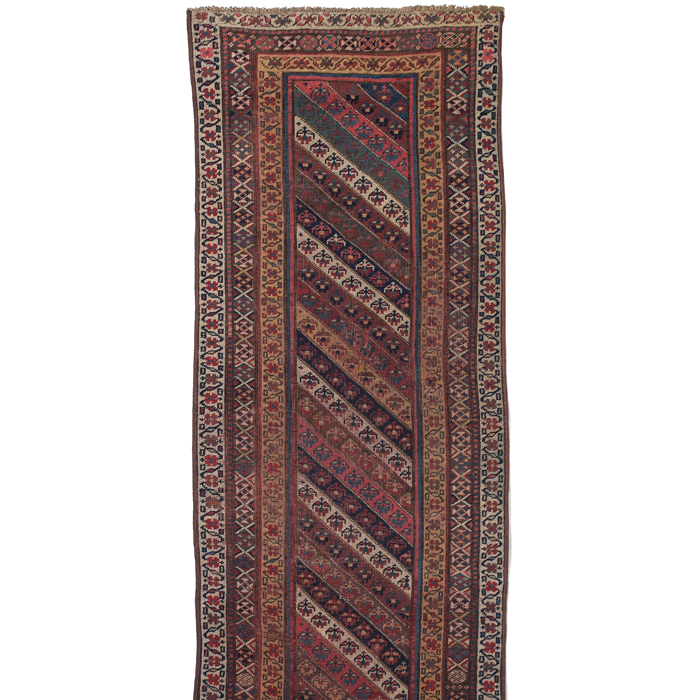 Appraisal: Persian Bidjar runner c floral design with diagonal stripes some